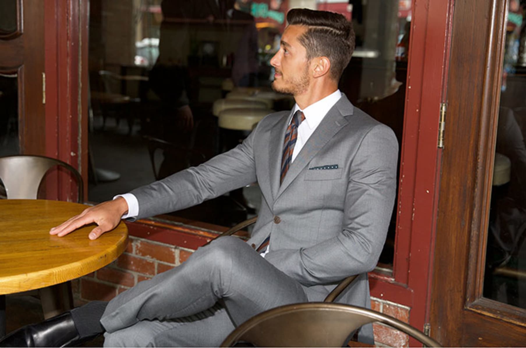 Bruce Wayne Looks The Dapper Billionaire In Bespoke Armani Suits